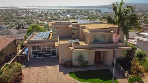 A photo of a properly sealed flat roof with solar panels.