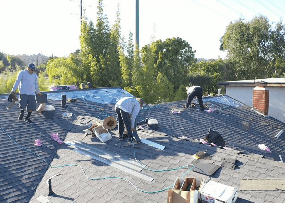 Resilient Roofing crew installing a residential roof